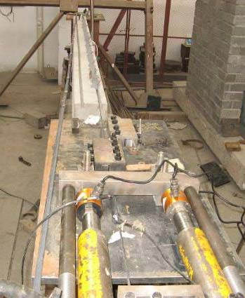 Strengthening the beam with prestressed NSM FRP strip