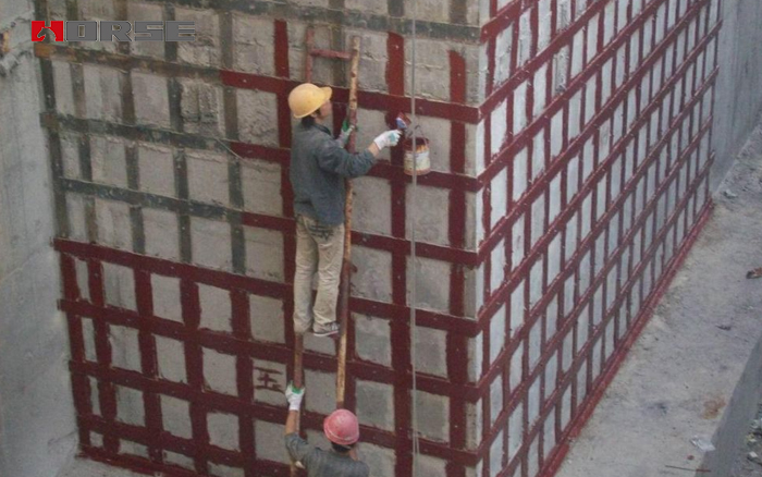 wall strengthening by adhesively bonded steel plate